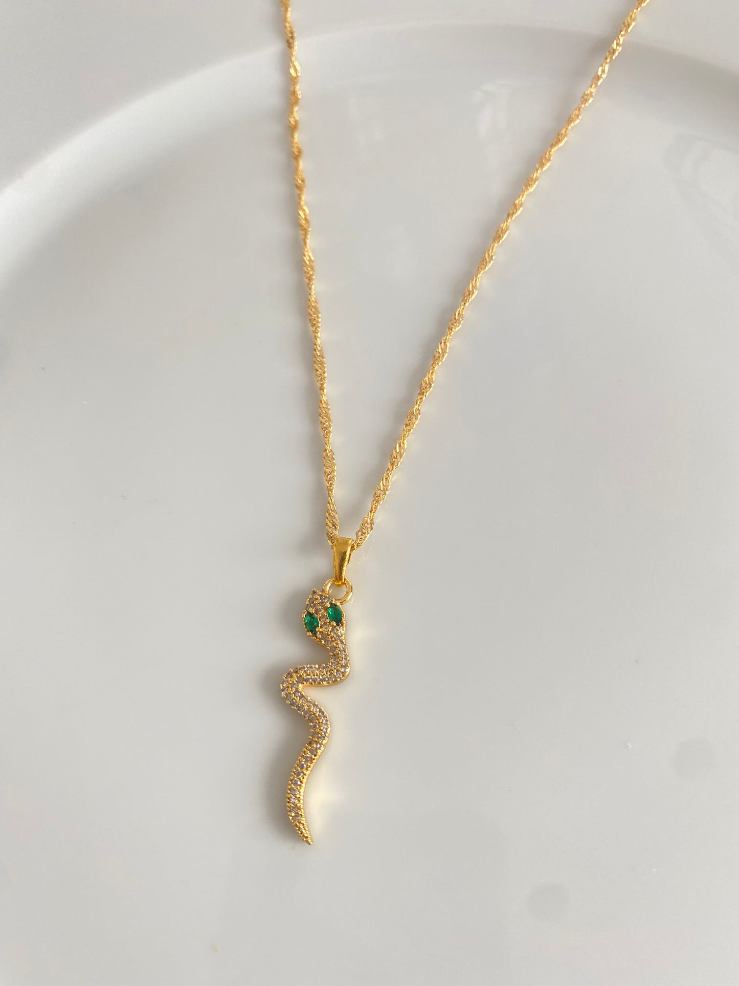 Green eyed snake necklace